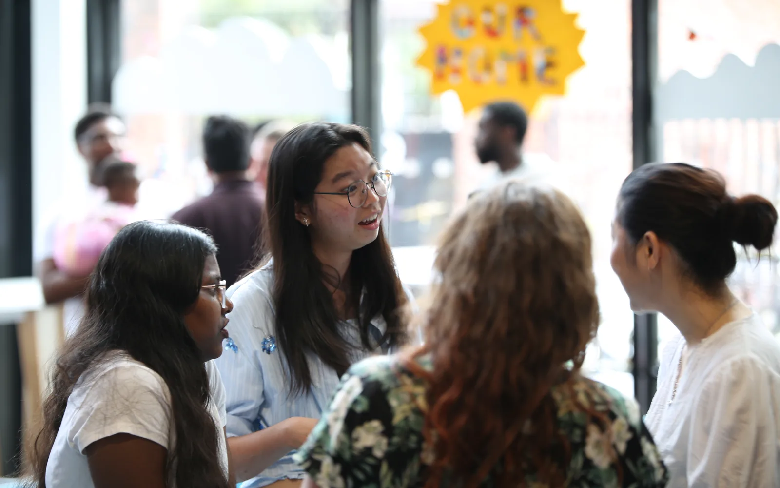 People gathered in conversation at a C3 Liverpool connect group